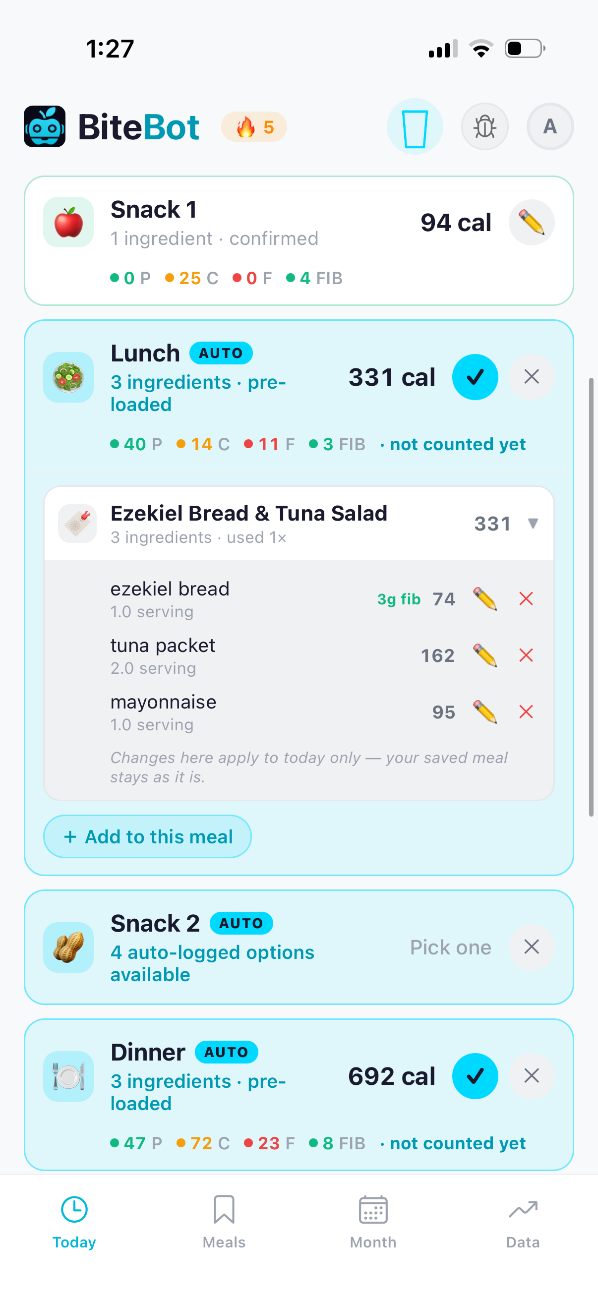 A meal opened to show every ingredient inside it